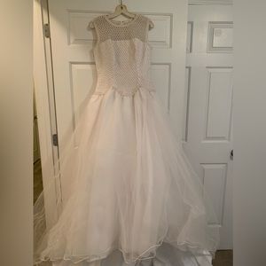 White wedding gown with train. Size 8